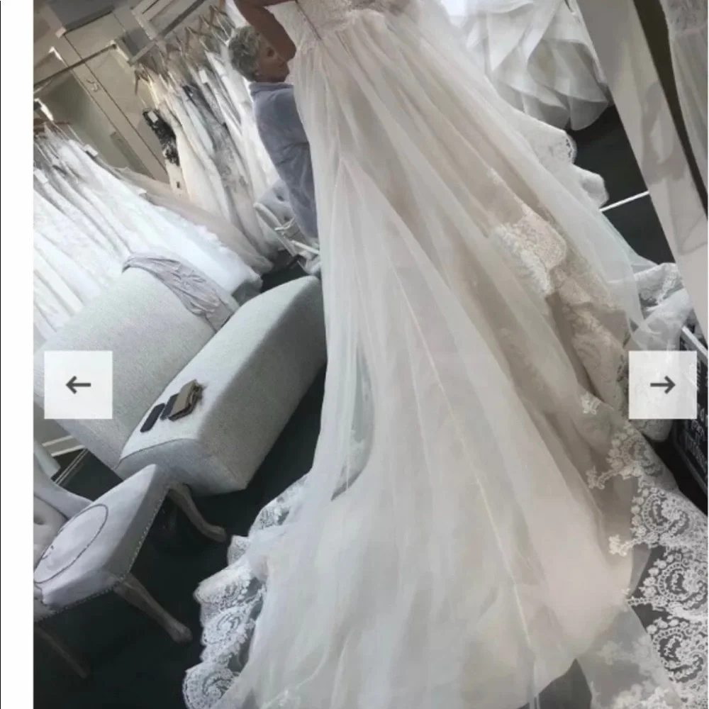 Justin Alexander Signature Sweetheart  Gown
cathedral length veil. - Picture 5 of 7